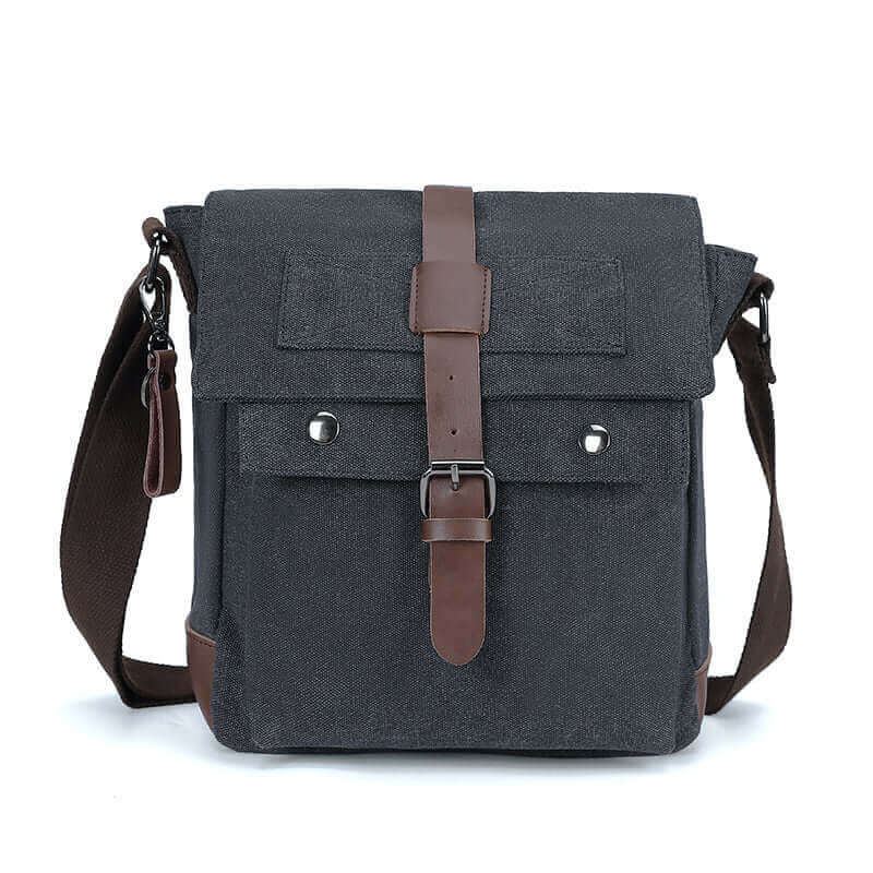 Black canvas shoulder bag for men with magnetic front flap, ideal for daily use and various occasions.