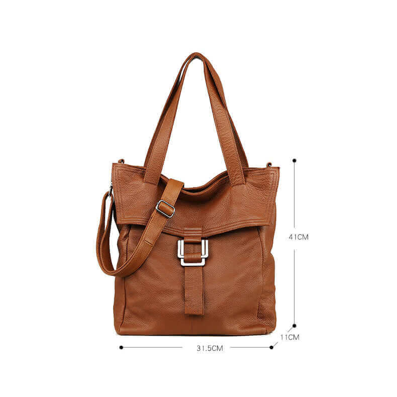 Brown leather shoulder bag with stylish buckle and adjustable strap.