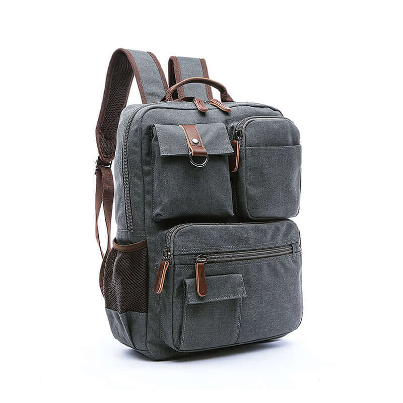 Canvas backpack with dedicated laptop compartment, suitable for carrying a 14-inch laptop and other essentials.