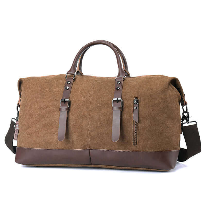 The spacious canvas travel duffle bag highlighting the side pocket and adjustable shoulder strap.