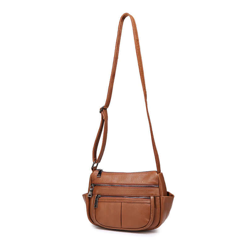 Elegant premium leather crossbody bag in brown, perfect for casual and formal outfits.