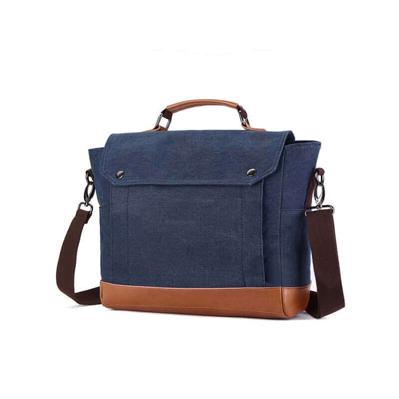 Close-up of the front flap with metal button accents, adding to the bag's classic appeal.