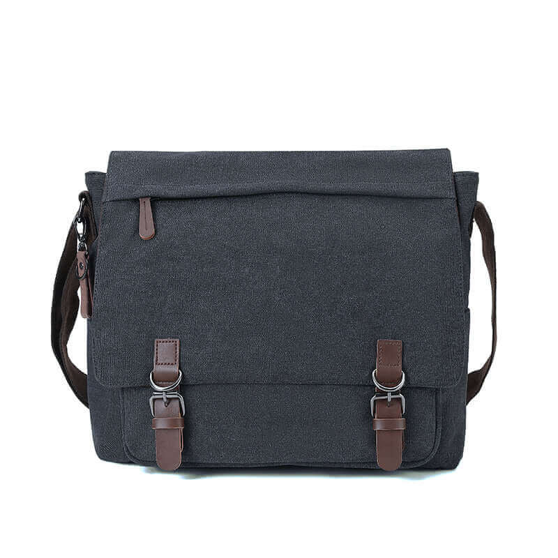 Stylish canvas laptop bag for shoulder and crossbody use.