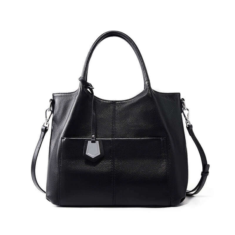 Black leather handbag styled with a casual outfit for daily use.