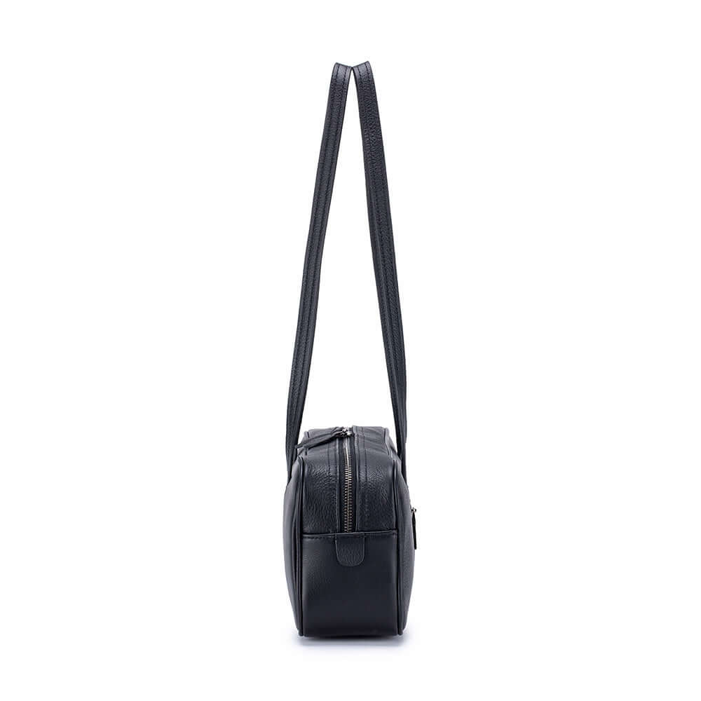 Side view of structured leather shoulder bag