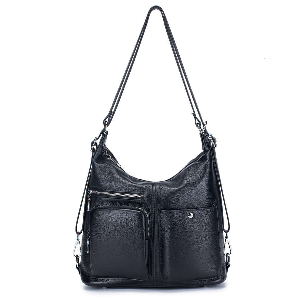 Front view of black leather women's backpack with multiple compartments.