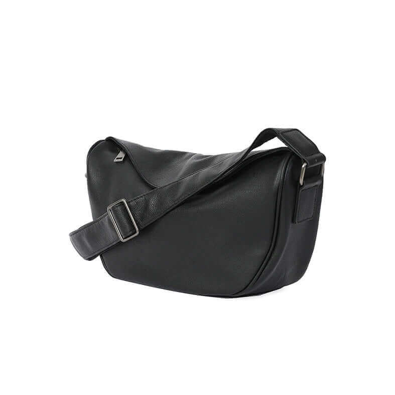 Minimalist design of the leather crossbody bag for a timeless fashion look.