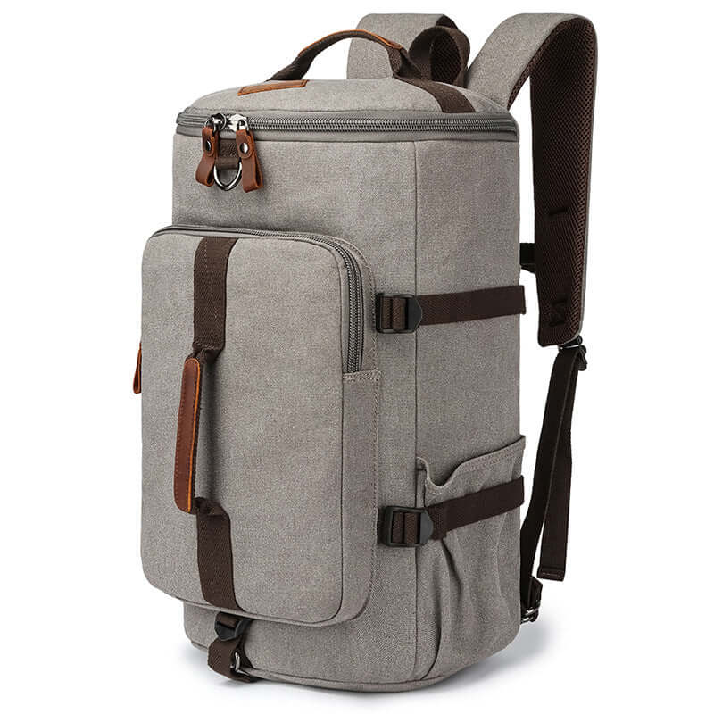 Front view of grey 3-in-1 canvas backpack with leather details