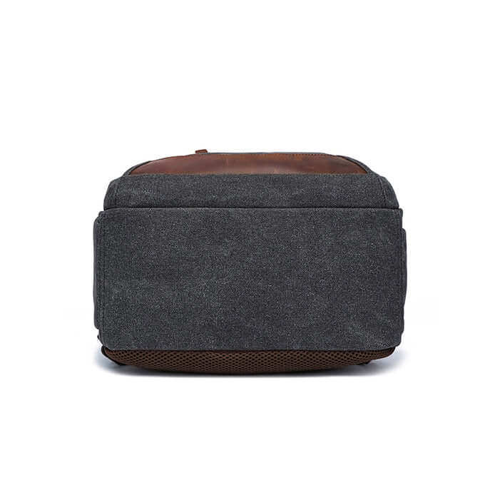 Reinforced leather base on stylish canvas backpack for durability