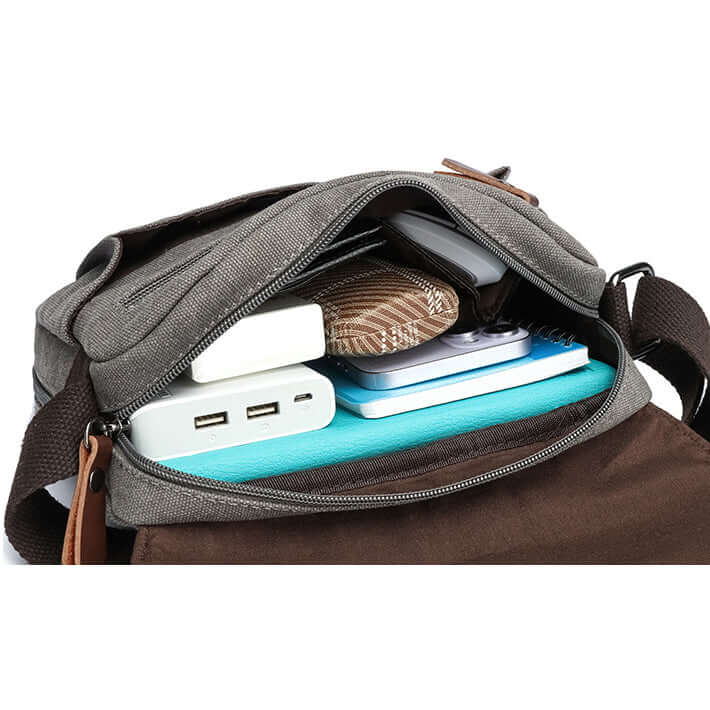 Multiple pockets inside canvas shoulder bag