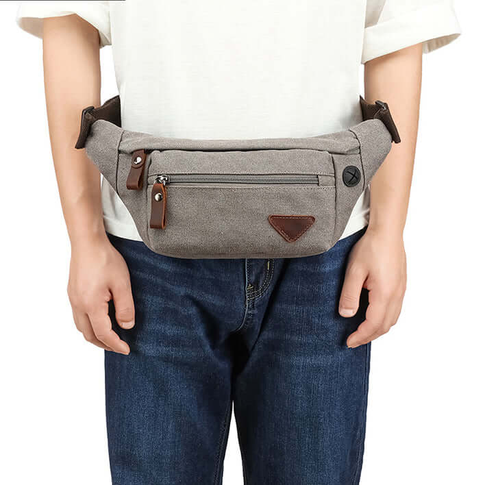 Stylish grey canvas bum bag worn by man
