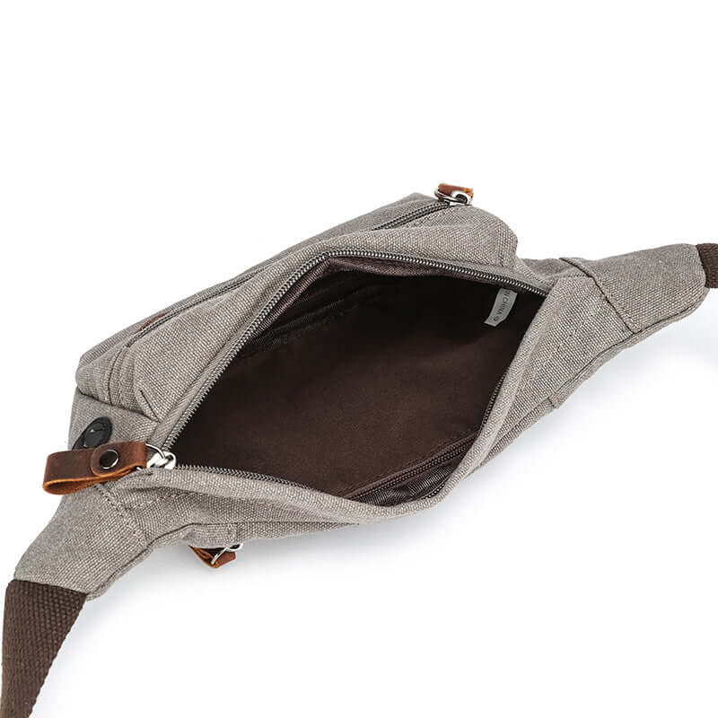 Open view of bum bag showing internal zippered pocket