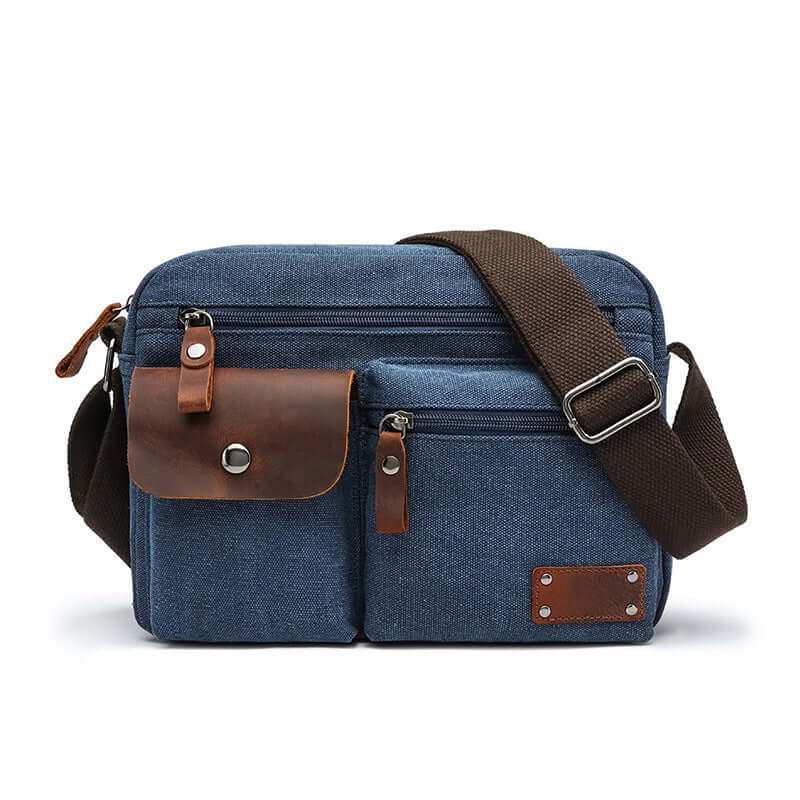 Blue canvas crossbody shoulder bag with leather trim