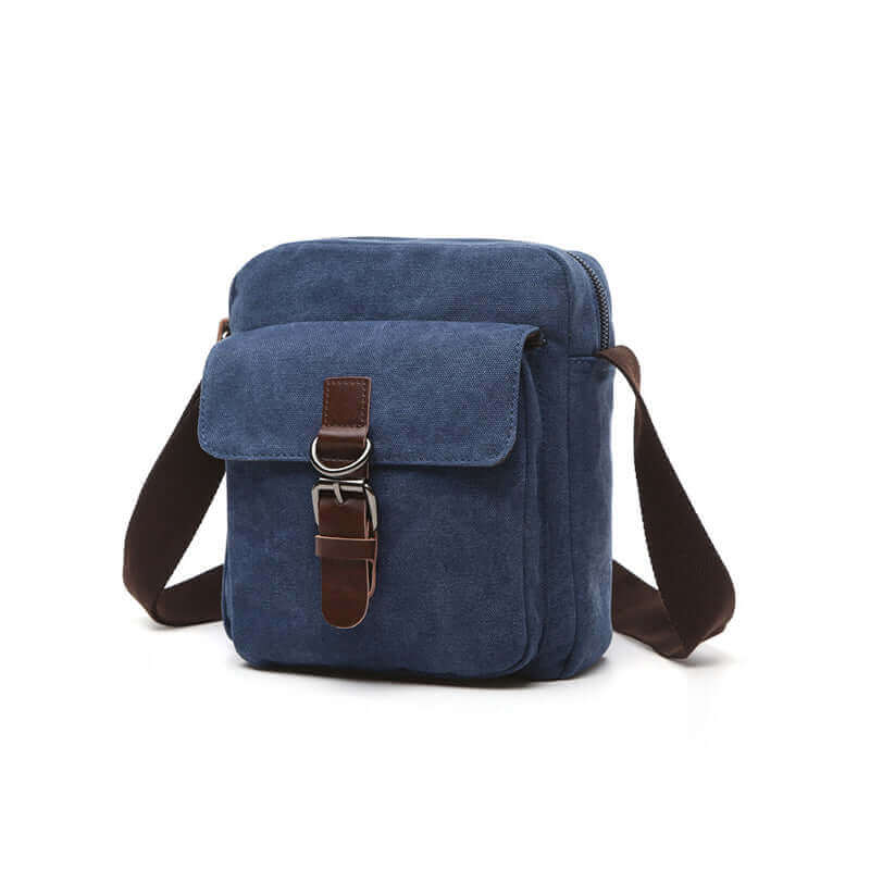 Blue canvas crossbody bag for casual outings.