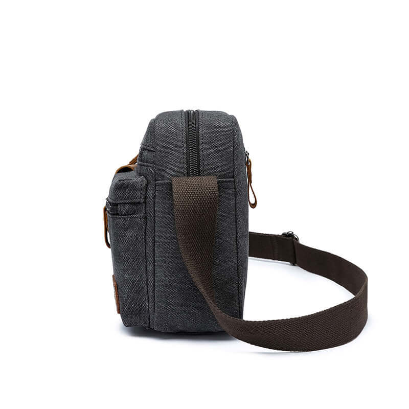 Front zip compartments on canvas crossbody bag