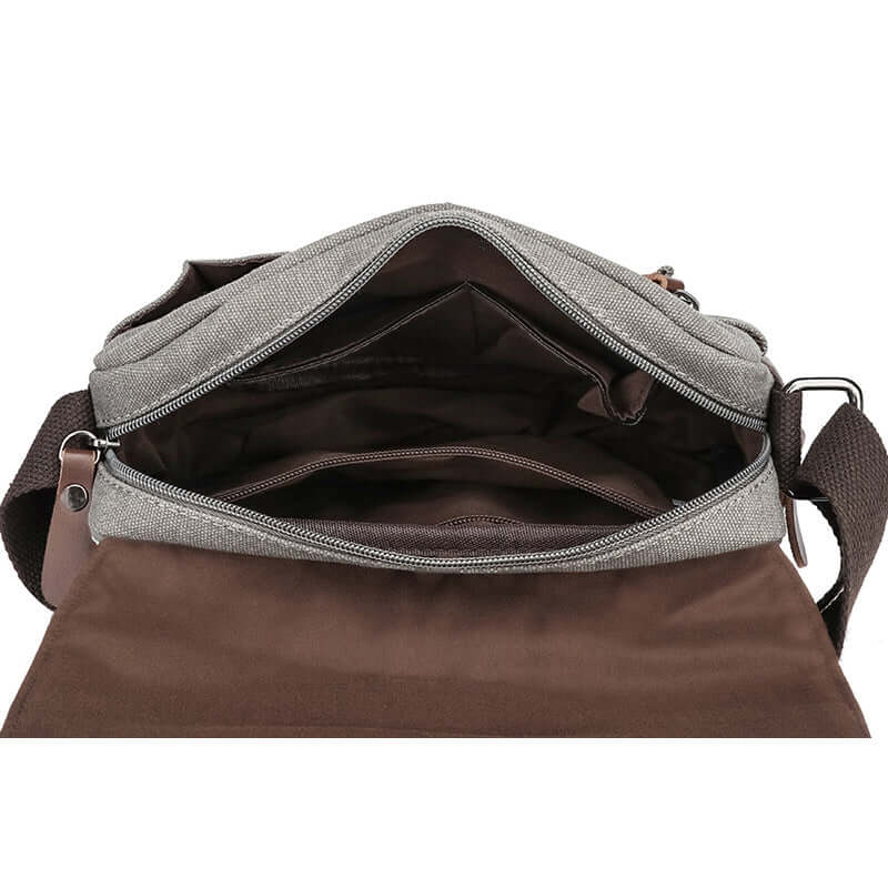 Open view showing compartments of shoulder bag