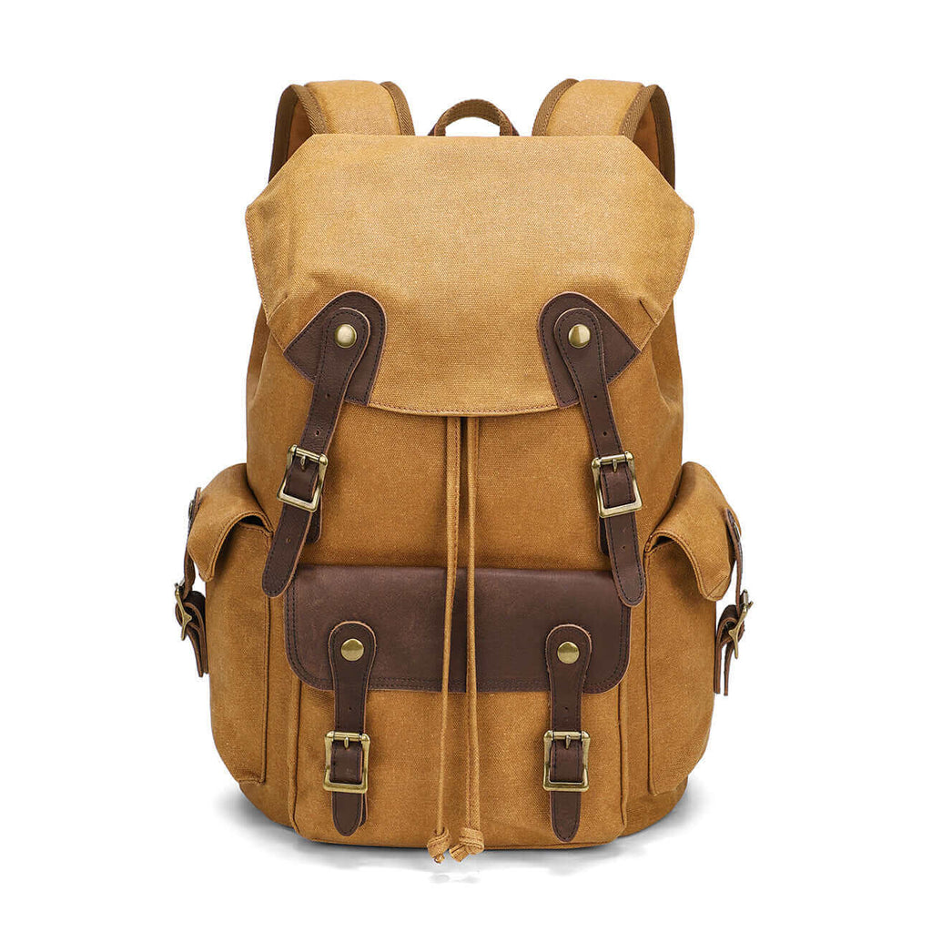 Canvas and leather laptop backpack designed for men, fitting up to a 16-inch laptop.