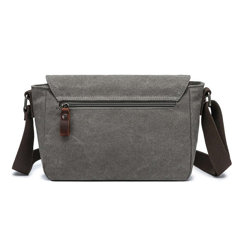 Adjustable shoulder strap of the unisex canvas crossbody bag.