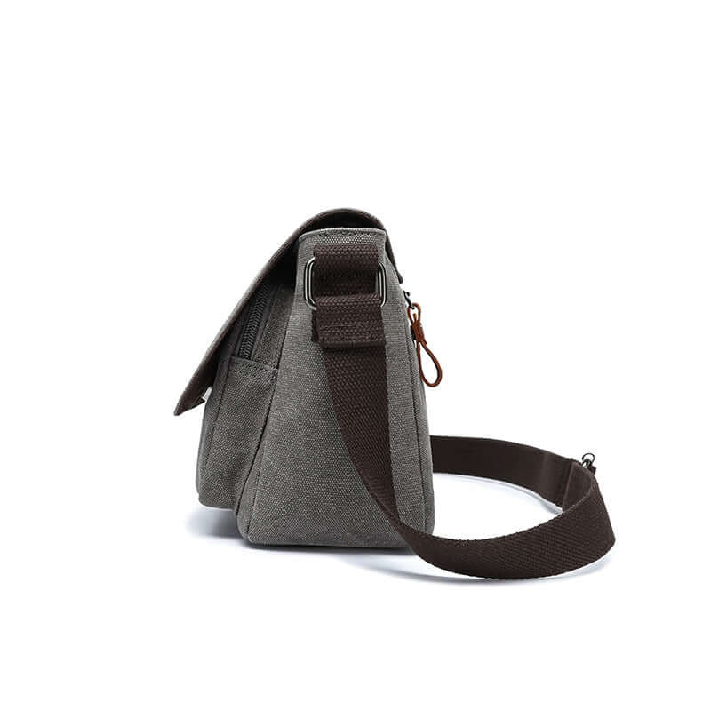 Side view of the crossbody sling bag with leather detail.