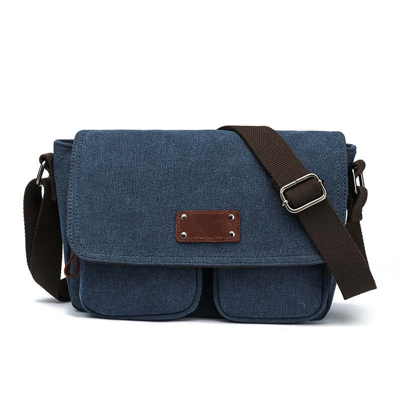 Blue canvas crossbody bag with adjustable strap for men and women.