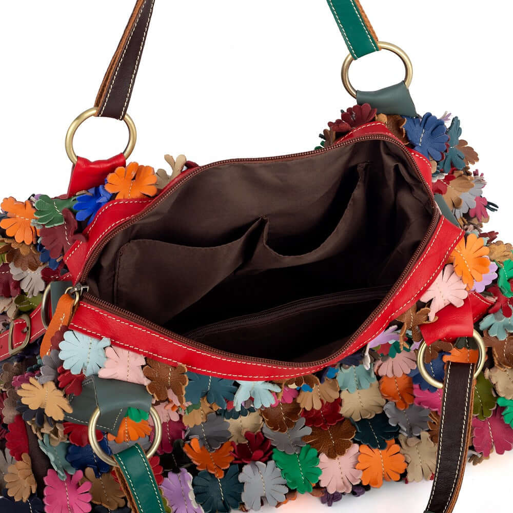 Interior of colorful leather floral tote bag with ample storage.