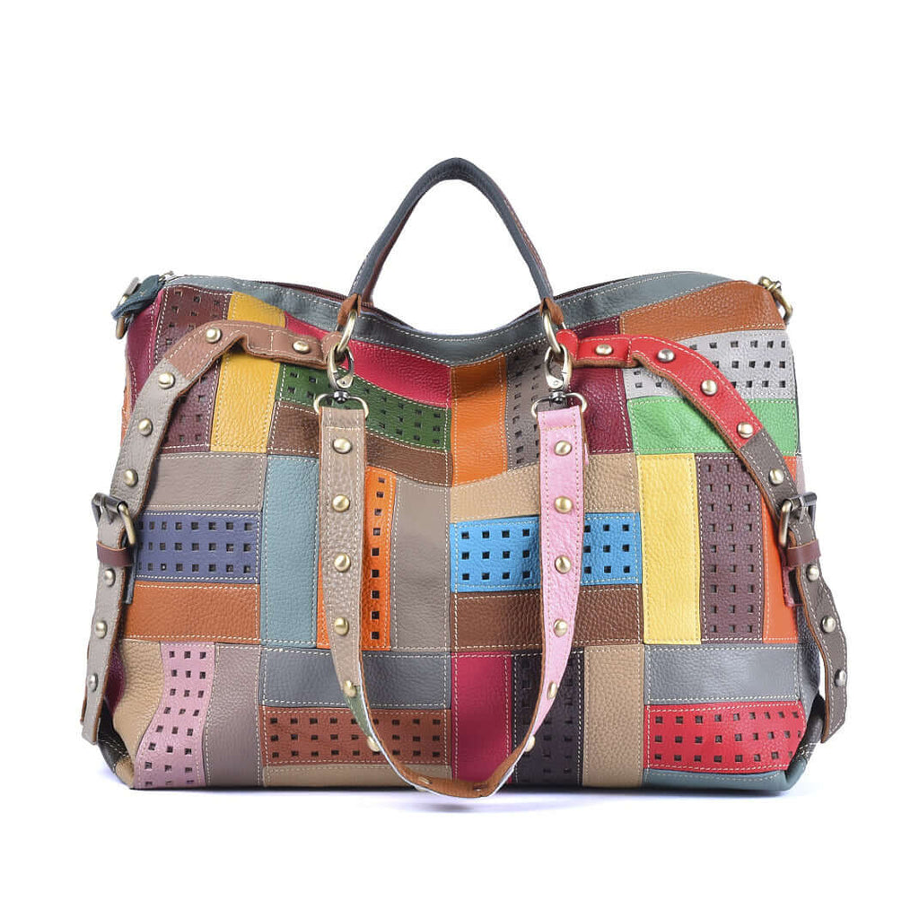 Front view of colorful leather patchwork handbag with soft genuine leather and adjustable straps.