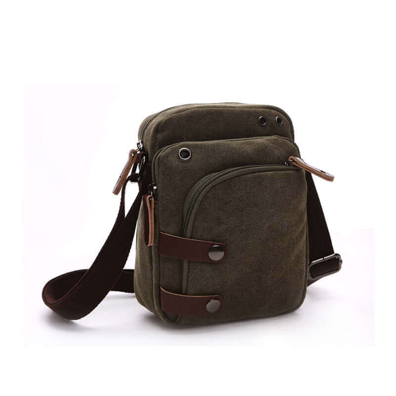 Compact men's canvas crossbody bag for storing daily essentials.