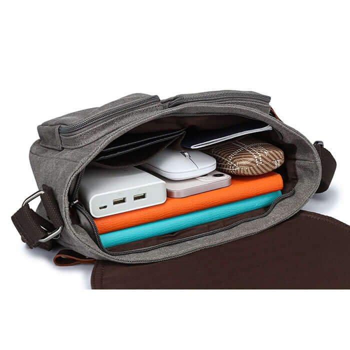 Small travel shoulder bag with durable canvas fabric.