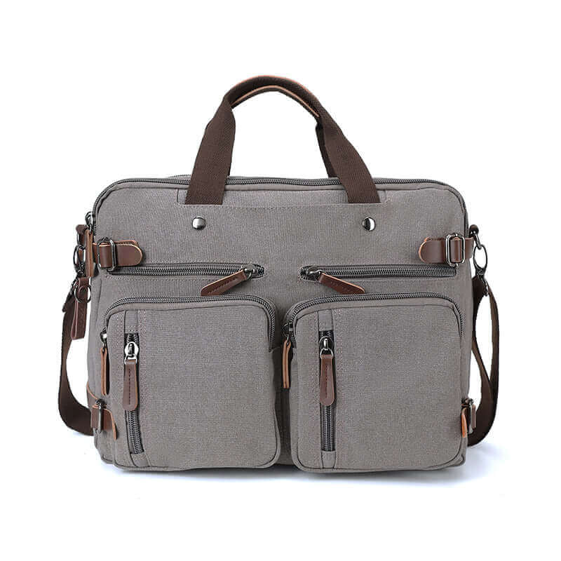 Canvas laptop bag fitting a 17-inch laptop with versatile carrying options.