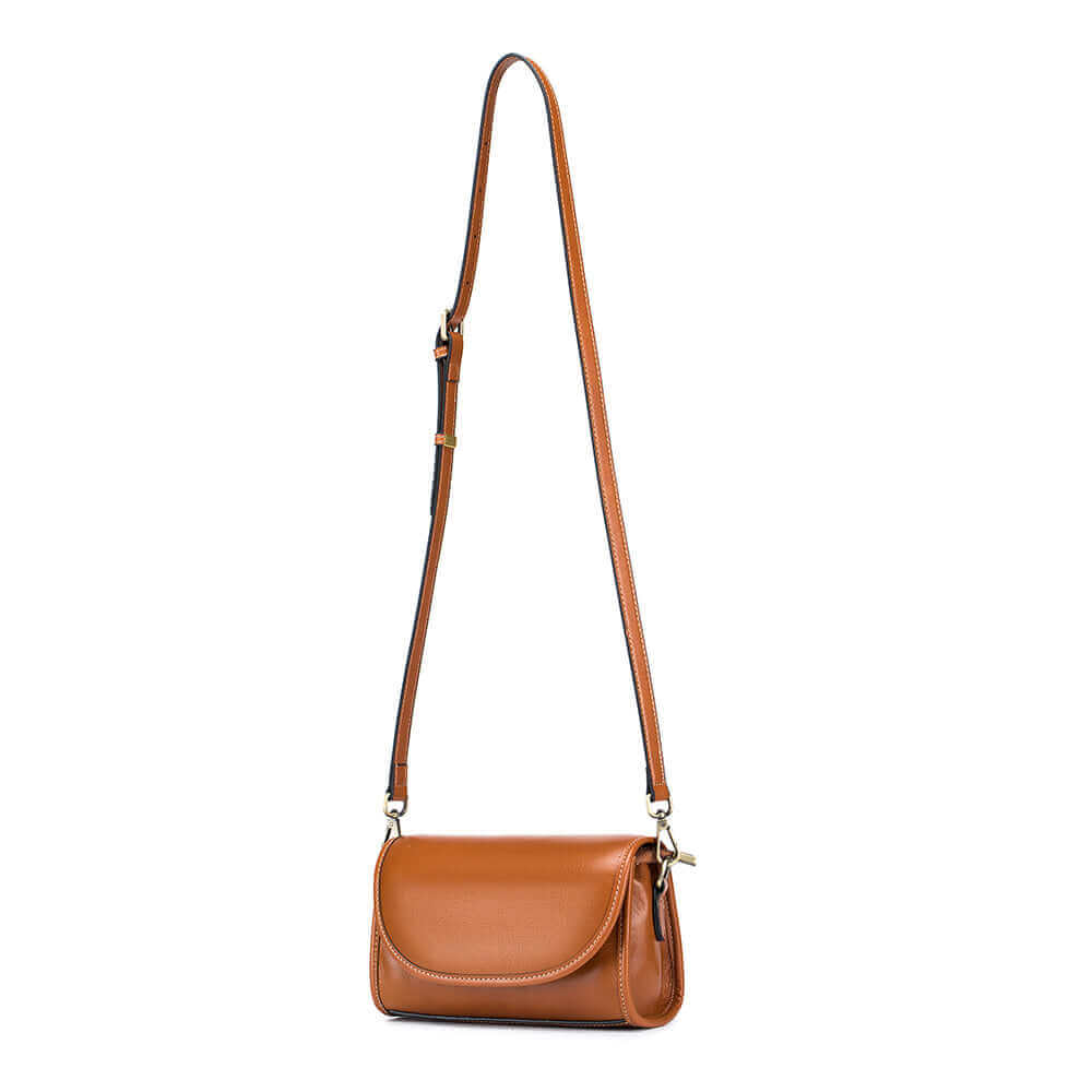 Adjustable leather and fabric straps of the vintage crossbody bag