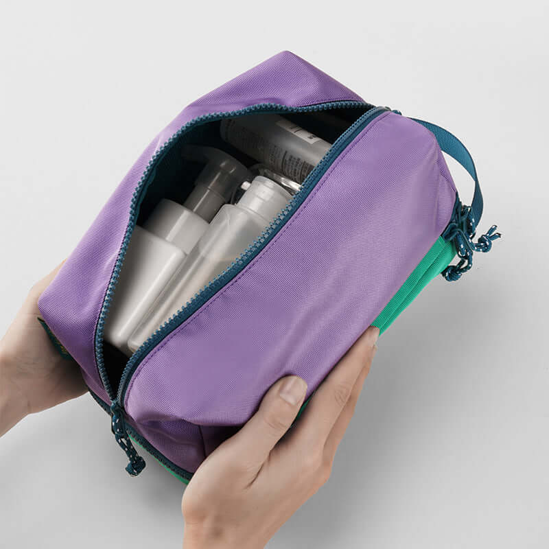 Dry compartment for personal items in travel toiletry bag.