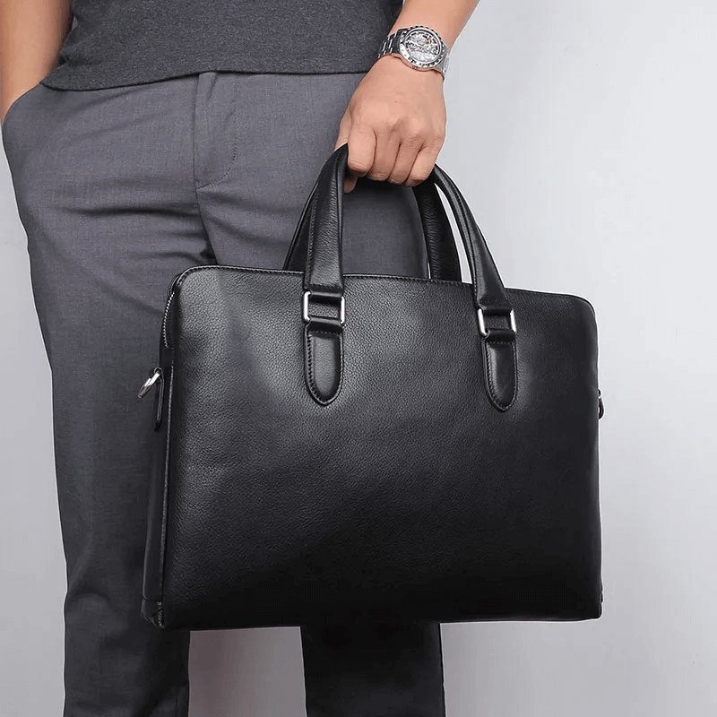 Organized compartments of the slim leather laptop bag for professionals.