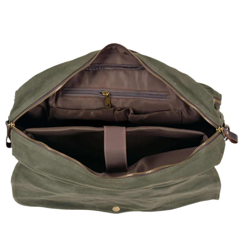 Open view of green canvas laptop bag showing compartments