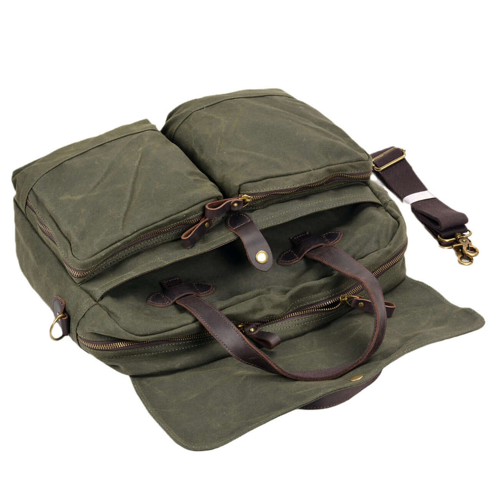 Shoulder strap and detailing of waxed canvas and leather briefcase
