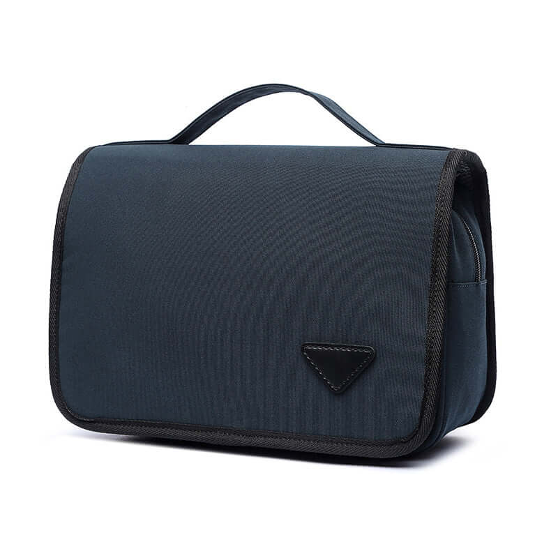 Front view of navy waterproof hanging toiletry bag for travel