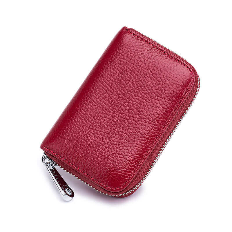 Red leather card holder with RFID protection, offering 12 card slots and compact convenience.