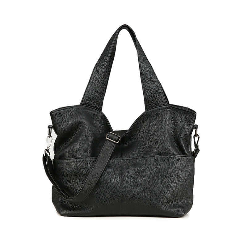 Women's leather tote handbag featuring an adjustable shoulder strap for versatile carrying options.