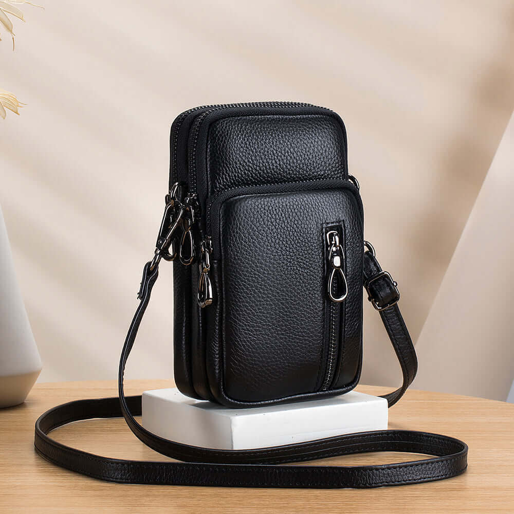 Leather mini crossbody bag, ideal for carrying your phone and small essentials.