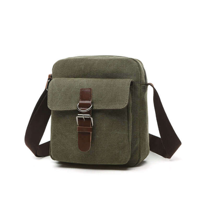 Men's canvas crossbody bag with belt buckle detail.