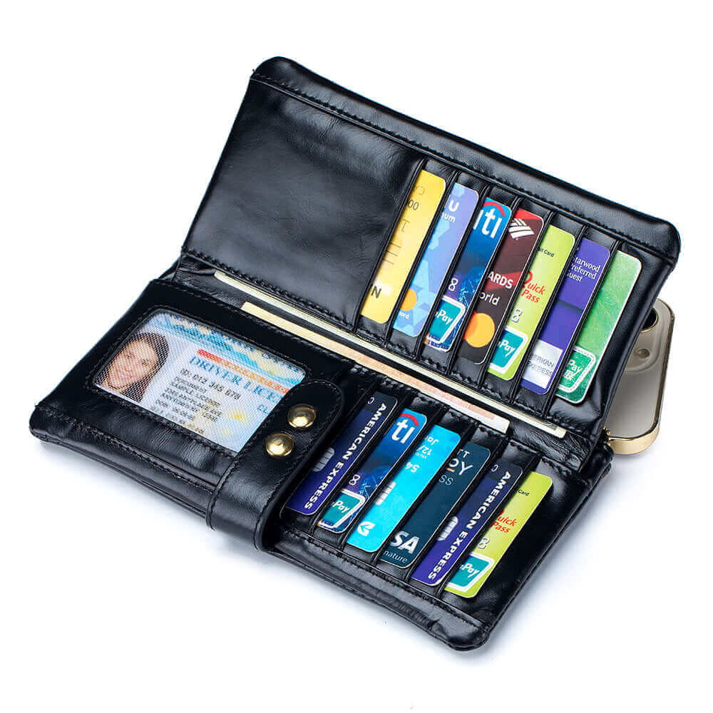 Open view of oil wax leather wallet showing card slots and cash pockets.