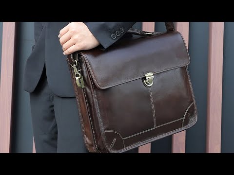 Closeup of the vintage-inspired detailing on the leather laptop bag.