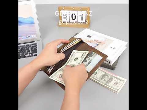 Card storage compartments inside vintage leather wallet.
