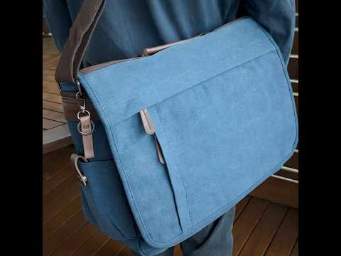 Spacious men's canvas messenger bag with ample storage for a 17-inch laptop.