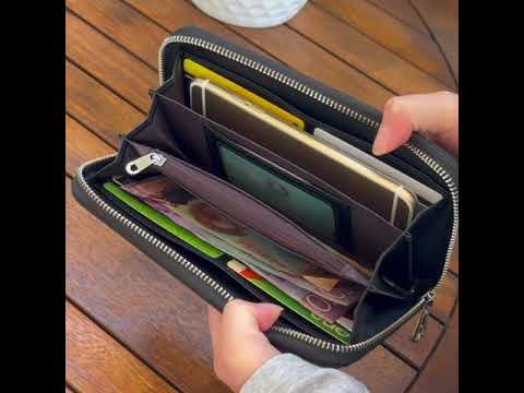 Black genuine leather RFID wallet designed for women, with ample storage.