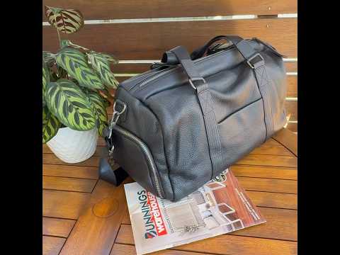 Black leather travel duffle bag for men and women