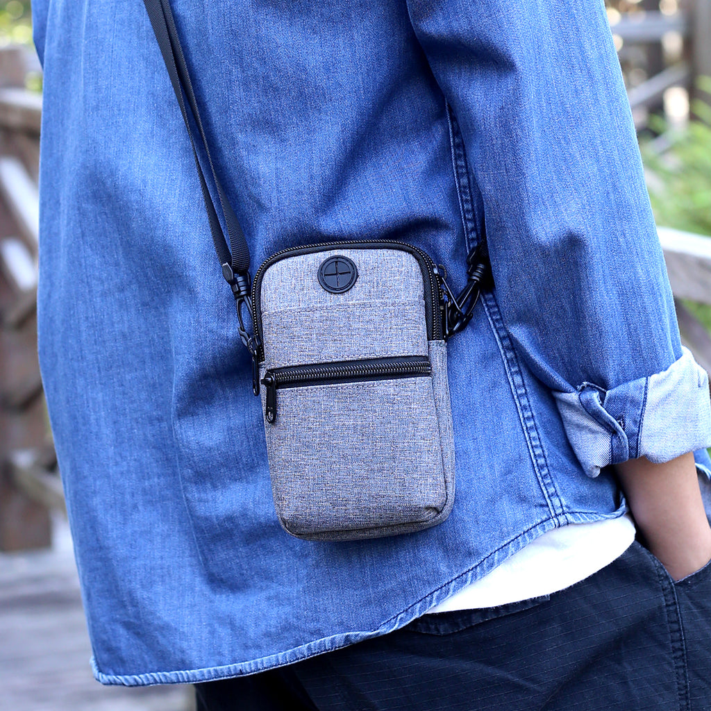 Water-resistant fabric on travel phone crossbody bag.