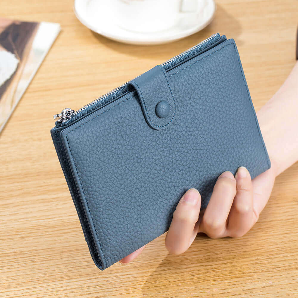 Stylish RFID-protected genuine leather travel wallet for passports and essentials.