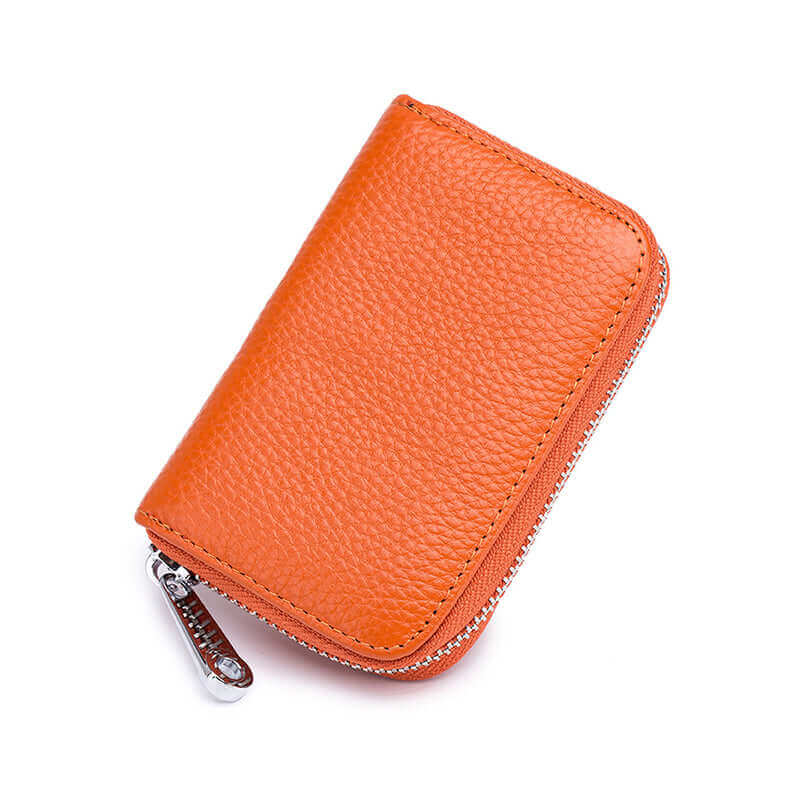 Orange RFID leather card holder with 12 card slots and compact design for secure storage.