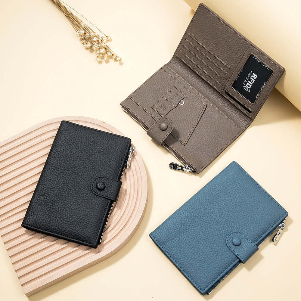 RFID-protected leather passport wallet in various colors for secure travel.