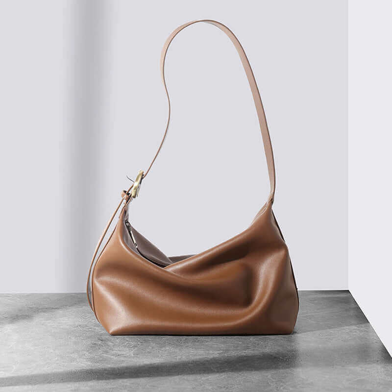  Front view of a soft leather shoulder bag, perfect for everyday use.